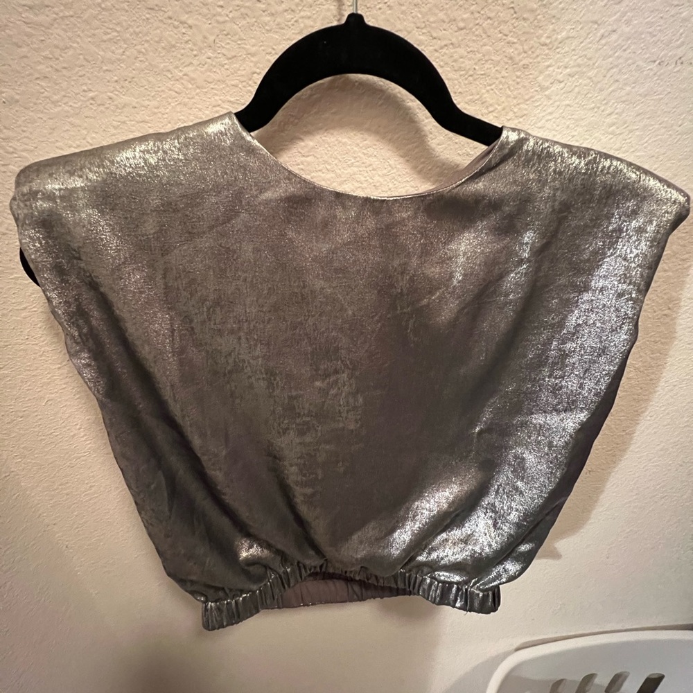 Metallic silver top